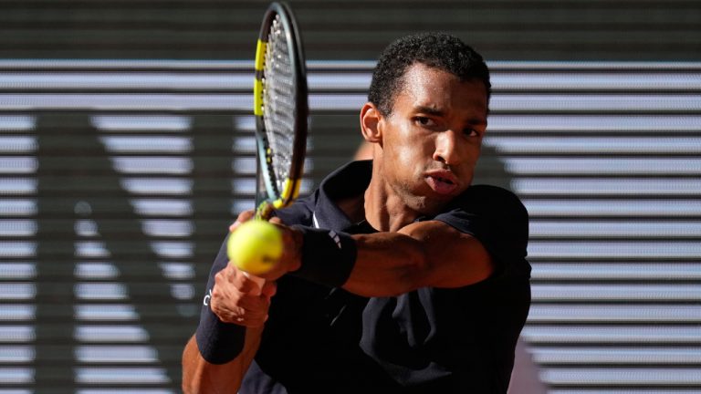 Canada's Felix Auger-Aliassime returns to Chile's Alejandro Tabilo during the fourth-round tennis match at the French Open in Paris, Monday, June 1, 2026. (Christophe Ena/AP)