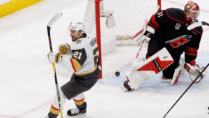 Vegas Golden Knights' Brett Howden (21) reacts ahead of Carolina Hurricanes' goaltender Frederik Andersen (31) after scoring a goal during the first period of Game 2 of the NHL hockey Stanley Cup Final series in Raleigh, N.C., Thursday, June 4, 2026. (Ben McKeown/AP)