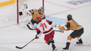 Carolina Hurricanes left wing Taylor Hall (71) scores past Vegas Golden Knights goaltender Carter Hart (79) during the first period in Game 6 of the NHL hockey Stanley Cup Final series, Sunday, June 14, 2026, in Las Vegas. (Candice Ward/AP)