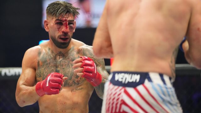 Ilia-Toupruia,-left,-fights-Justin-Gaethje-during-their-lightweight-title-bout-at-UFC-Freedom-250-on-the-South-Lawn-of-the-White-House