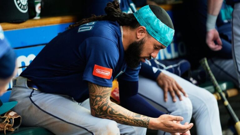 Seattle Mariners' J.P. Crawford (3) sits on the bench after being hit by a pitch against the Detroit Tigers during the third inning of a baseball game Friday, June 5, 2026, in Detroit. (Paul Sancya/AP)