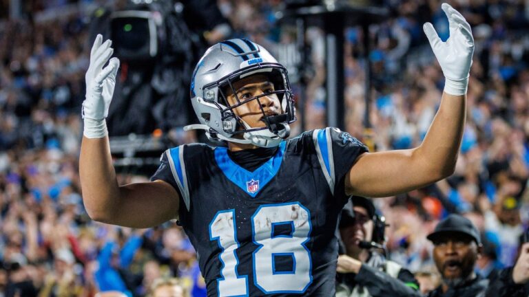 Carolina Panthers wide receiver Jalen Coker (18) celebrates a touchdown during an NFL football game against the Los Angeles Rams, Saturday, Jan. 10, 2026, in Charlotte, N.C. (AP Photo/Rusty Jones)