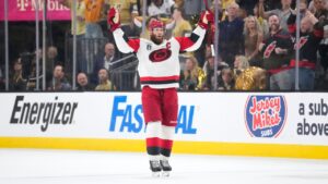 Carolina Hurricanes center Jordan Staal celebrates an empty net goal by left wing Nikolaj Ehlers during the third period in Game 4 of the NHL hockey Stanley Cup Final series against the Vegas Golden Knights, Tuesday, June 9, 2026, in Las Vegas. (John Locher/AP)