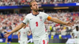 England's Harry Kane (9) celebrates after scoring a goal during the World Cup Group L soccer match between England and Croatia in Arlington, Texas, near Dallas, Wednesday, June 17, 2026. (AP Photo/Tony Gutierrez)