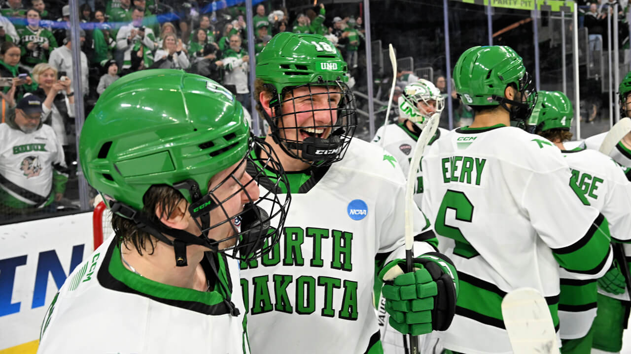 Defenceman Keaton Verhoeff laughs with North Dakota teammates during an NCAA Regionals matchup against Quinnipiac. (Photo courtesy of North Dakota Athletics)