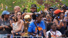 ‘Taking it all in’: Knicks fans swarm New York for championship parade