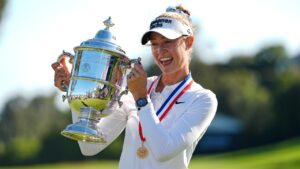 Nelly Korda holds the trophy after winning the U.S. Women's Open golf tournament Sunday, June 7, 2026, in the Pacific Palisades area of Los Angeles. (AP Photo/Ashley Landis)