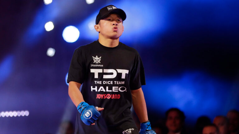 Japan's Kyoji Horiguchi approaches the ring for a bantamweight championship mixed martial arts bout against Darrion Caldwell at Bellator 222, Friday, June 14, 2019, in New York. Horiguchi won the fight. (Frank Franklin II/AP)