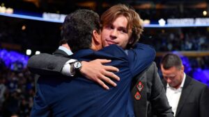 Gavin McKenna is congratulated after being drafted by the Toronto Maple Leafs during the NHL hockey draft Friday, June 26, 2026, in Buffalo, N.Y. (Adrian Kraus/AP)