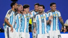 Messi’s first World Cup hat trick powers Argentina past Algeria