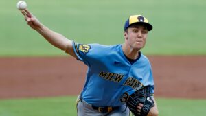 Milwaukee Brewers pitcher Jacob Misiorowski, right, delivers a pitch to Atlanta Braves' Matt Olson during the first inning of a baseball game, Friday, June 19, 2026, in Atlanta. (AP Photo/Erik S. Lesser)