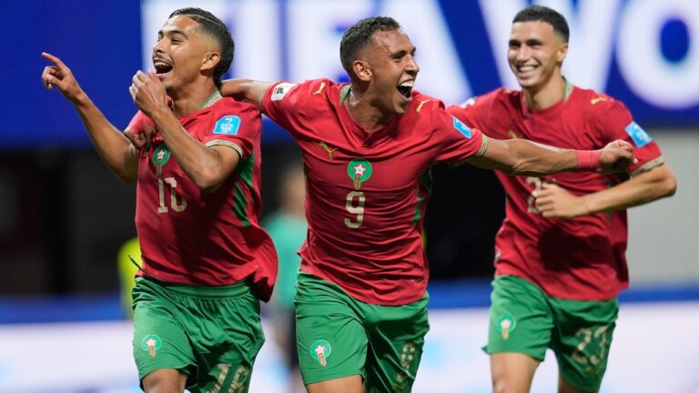 Morocco's Gessime Yassine, left, celebrates Soufiane Rahimi (9) and Bilal El Khannouss (23) after scoring their fourth goal during the World Cup Group C soccer match between Morocco and Haiti in Atlanta, Wednesday, June 24, 2026. (AP Photo/Mike Stewart)