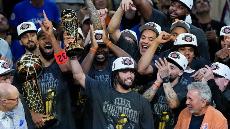 New York Knicks guard Jalen Brunson holds the MVP trophy after the Knicks defeated the San Antonio Spurs in Game 5 of the NBA Finals basketball series, Saturday, June 13, 2026, in San Antonio. (Ross D. Franklin/AP)