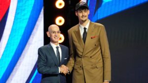 Aday Mara, right, poses for a photo with NBA Commissioner Adam Silver, left, after being selected by the Oklahoma City Thunder as the 12th pick in the first round of the NBA basketball draft, Tuesday, June 23, 2026, in New York. (Yuki Iwamura/AP)