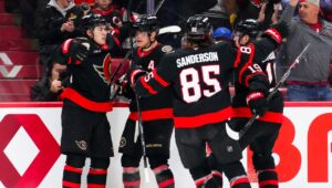 Ottawa Senators' Jordan Spence (left), celebrates a goal with teammates while taking on the Tampa Bay Lightning during second period NHL hockey action in Ottawa on Tuesday, April 7, 2026. (Sean Kilpatrick/CP)