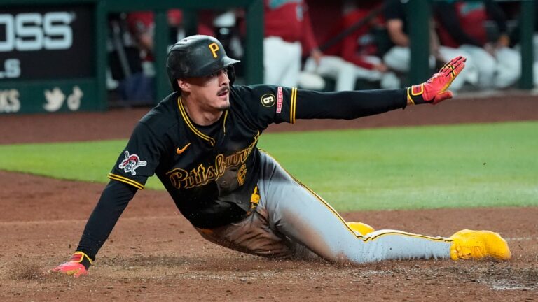 Pittsburgh Pirates' Konnor Griffin calls himself safe after the home plate umpire called him out during the seventh inning of a baseball game against the Arizona Diamondbacks, Wednesday, May 6, 2026, in Phoenix. (Ross D. Franklin/AP)