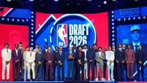 Prospective draftees pose for a group photo with NBA Commissioner Adam Silver, center, before the first round of the NBA basketball draft, Tuesday, June 23, 2026, in New York. (Yuki Iwamura/AP)