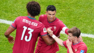 Portugal's Renato Veiga (13), Portugal's Cristiano Ronaldo (7) and Portugal's Francisco Conceicao (26) celebrate their win after the World Cup Group K soccer match between Portugal and Uzbekistan in Houston, Tuesday, June 23, 2026. (Karen Warren/AP)