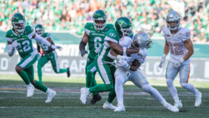 BC Lions running back James Butler (20) is tackled during first half CFL football action against the Saskatchewan Roughriders, in Regina on Saturday, June 13, 2026. (Kayle Neis/CP)