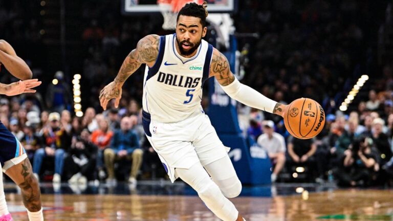 Dallas Mavericks guard D'Angelo Russell (5) drives against Oklahoma City Thunder during the first half of an NBA basketball game, Friday, Dec. 5, 2025, in Oklahoma City. (Gerald Leong/AP)