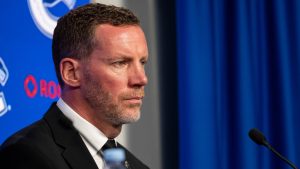 Vancouver Canucks general manager Ryan Johnson pauses as he speaks with media during an announcement in Vancouver, on Thursday, May 14, 2026. (Ethan Cairns/CP)