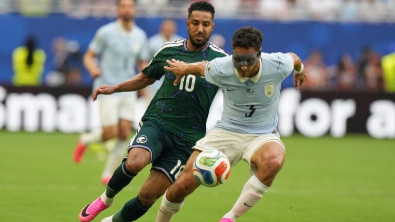 Saudi Arabia's Salem Aldawsari chases Uruguay's Sebastian Caceres during a World Cup Group H soccer match in Miami Gardens, Fla., Monday, June 15, 2026. (Lynne Sladky/AP)