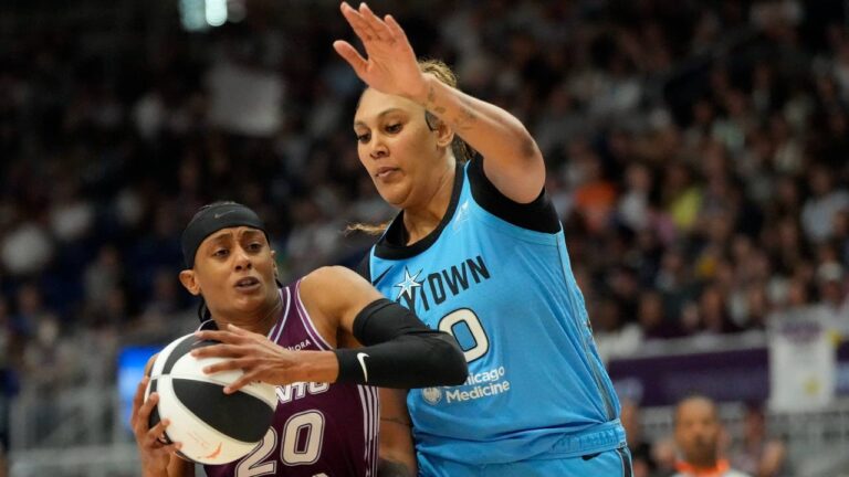 Toronto Tempo guard Brittney Sykes (20) controls the ball as Chicago Sky center Kamilla Cardoso (10) defends during first half WNBA action in Toronto, Sunday, June 7, 2026. (Frank Gunn/CP)