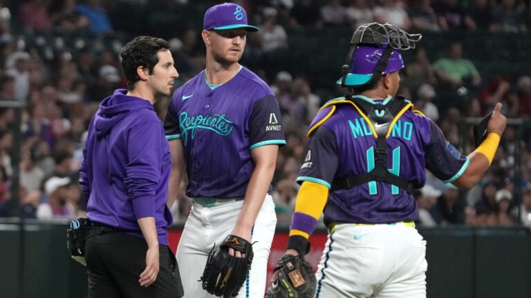 Arizona Diamondbacks pitcher Michael Soroka, centre, leaves in the second inning of a baseball game against the Minnesota Twins, Friday, June 19, 2026, in Phoenix. (AP Photo/Rick Scuteri)