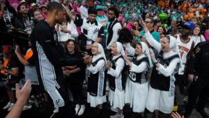 The Salesian Sisters greet players prior to Game 1 of the NBA Finals basketball series between the New York Knicks and the San Antonio Spurs, Wednesday, June 3, 2026, in San Antonio. (AP Photo/Eric Gay)