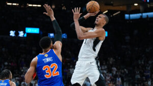 San Antonio Spurs forward Victor Wembanyama shoots as New York Knicks centre Karl-Anthony Towns (32) defends during the first half of Game 5 of the NBA Finals basketball series, Saturday, June 13, 2026, in San Antonio. (Ross D. Franklin/AP)
