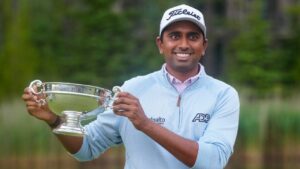 Sudarshan Yellamaraju, of Mississauga, Ont., holds his trophy for lowest Canadian score at the RBC Canadian Open, in Caledon, Ont. on Sunday June 14, 2026. (Frank Gunn/CP)
