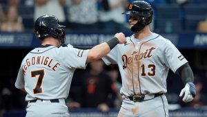 Detroit Tigers' Dillon Dingler (13) celebrates with Kevin McGonigle (7) after Dingler hit a two-run home run off Tampa Bay Rays pitcher Griffin Jax during the third inning of a baseball game Monday, June 1, 2026, in St. Petersburg, Fla. (Chris O'Meara/AP)