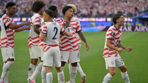 United States' Christian Pulisic, right, celebrates with teammates after an own goal by Paraguay's Damian Bobadilla during the World Cup Group D soccer match in Inglewood, Calif., near Los Angeles, Friday, June 12, 2026. (Jayne Kamin-Oncea/AP)