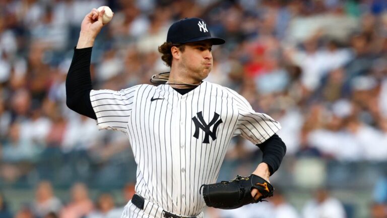 New York Yankees pitcher Cam Schlittler throws against the Cincinnati Reds during the first inning of a baseball game, Friday, June 19, 2026, in New York. (AP Photo/Noah K. Murray)