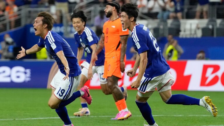 Japan's Koki Ogawa, left, celebrates after scoring during the World Cup Group F soccer match between the Netherlands and Japan in Arlington, Texas, near Dallas, Sunday, June 14, 2026. (AP Photo/Tony Guttierez)