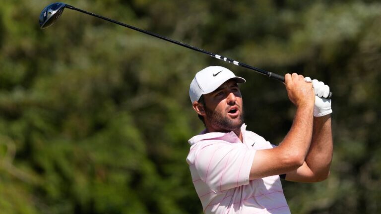 Scottie Scheffler watches his tee shot on the sixth hole during the final round of the U.S. Open golf tournament at Shinnecock Hills Golf Club in Southampton, N.Y., Sunday, June 21, 2026. (AP Photo/David J. Phillip)