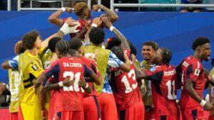 Cape Verde's Helio Varela (26) celebrates with teammates after scoring his team's second goal during the World Cup Group H soccer match between Uruguay and Cape Verde in Miami Gardens, Fla., Sunday, June 21, 2026. (AP Photo/Rebecca Blackwell)