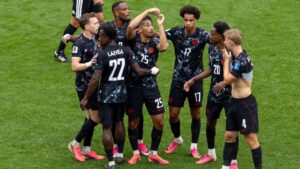 Canada's Nathan Saliba (25) makes the number