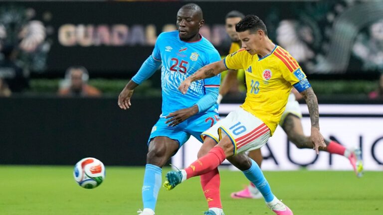 Colombia's James Rodriguez (10) battles for the ball with Congo's Edo Kayembe (25) during the World Cup Group K soccer match between Colombia and Congo in Zapopan, near Guadalajara, Mexico, Tuesday, June 23, 2026. (AP Photo/Fernando Llano)