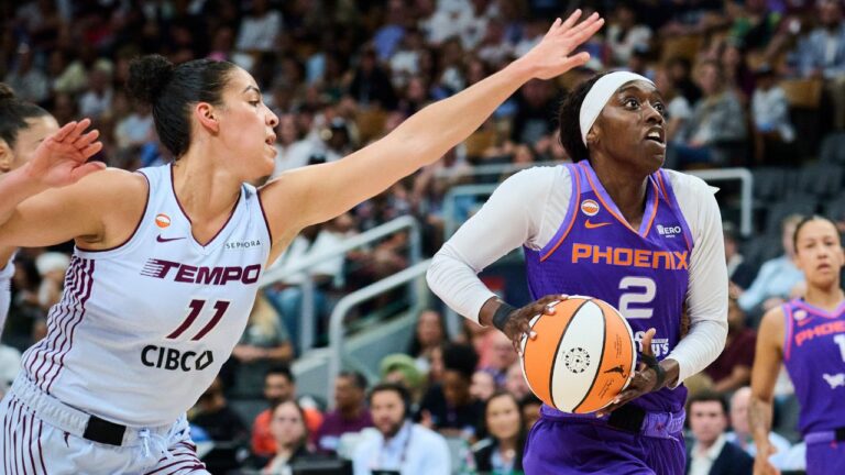 Phoenix Mercury's Kahleah Copper (2) drives to the net past Toronto Tempo's Kia Nurse (11) during first half WNBA basketball action in Toronto, on Saturday, June 27, 2026. THE CANADIAN PRESS/Sammy Kogan