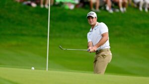 Viktor Hovland, of Norway, watches his shot land near the pin on the 15th green during the third round of the Travelers Championship golf tournament at TPC River Highlands, Saturday, June 27, 2026, in Cromwell, Conn. (AP Photo/Jessica Hill)