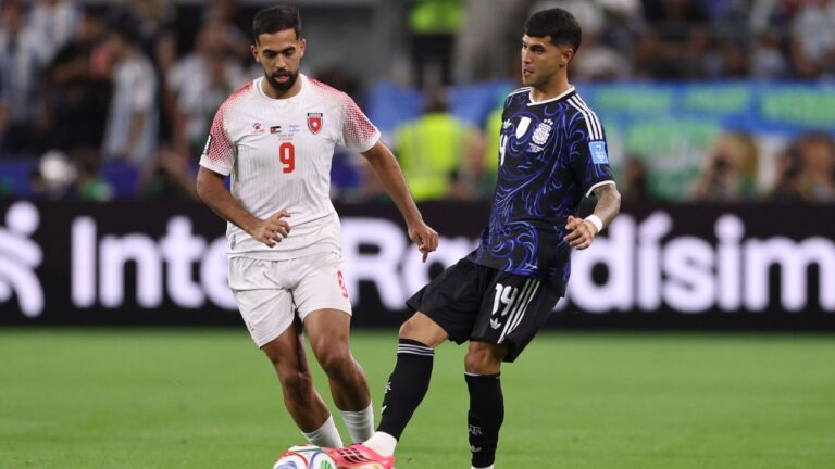 Jordan's Ali Olwan (9) and Argentina's Exequiel Palacios (14) battle during the World Cup Group J soccer match between Jordan and Argentina in Arlington, Texas, near Dallas, Saturday, June 27, 2026. (AP Photo/Sam Hodde)