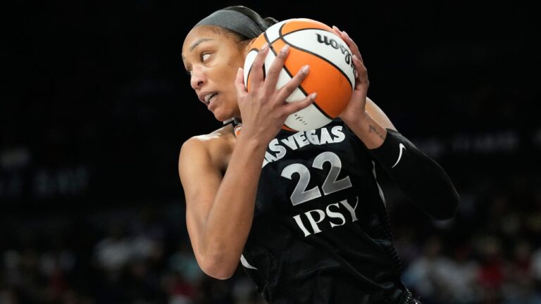 Las Vegas Aces center A'ja Wilson (22) plays against the Golden State Valkyries in a WNBA basketball game Sunday, June 21, 2026, in Las Vegas. (AP Photo/John Locher)