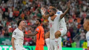 Morocco's Issa Diop is congratulated by teammates Soufiane Rahimi (9) and Chemsdine Talbi, left, after he scored his team's first goal during the World Cup round of 32 soccer match between the Netherlands and Morocco in Guadalupe, near Monterrey, Mexico, Monday, June 29, 2026. (AP Photo/Ricardo Mazalan)