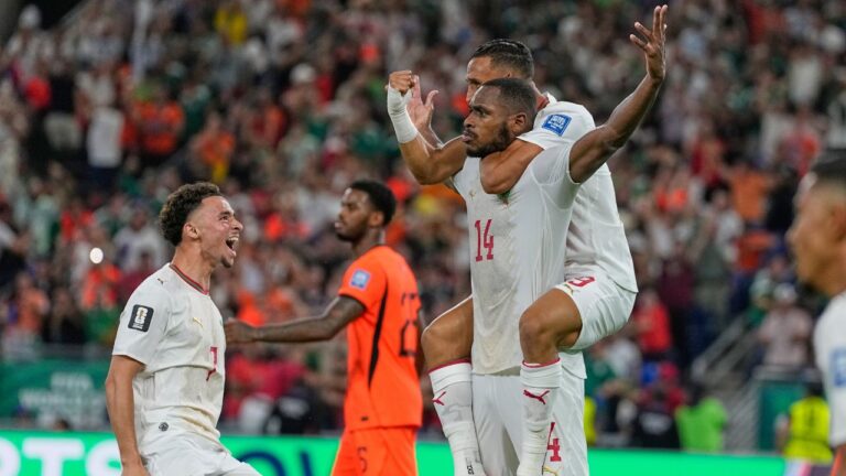 Morocco's Issa Diop is congratulated by teammates Soufiane Rahimi (9) and Chemsdine Talbi, left, after he scored his team's first goal during the World Cup round of 32 soccer match between the Netherlands and Morocco in Guadalupe, near Monterrey, Mexico, Monday, June 29, 2026. (AP Photo/Ricardo Mazalan)