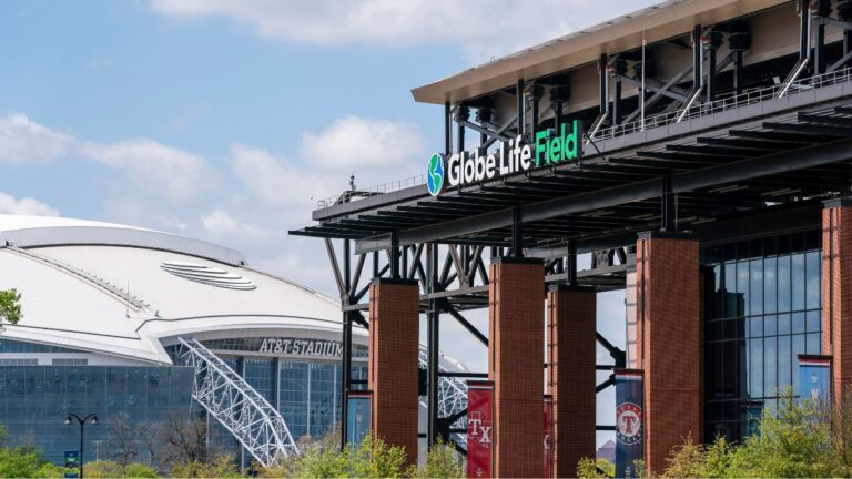 The facade of Globe Life Field stands in front of the Dallas Cowboys' AT&T Stadium before a baseball game between the Texas Rangers and the Toronto Blue Jays, April 5, 2021, in Arlington, Texas. (Jeffrey McWhorter/AP)