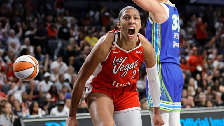 Las Vegas Aces' centre A'ja Wilson after scoring against Dallas Wings forward Jessica Shepard during a game on Thursday, June 25, 2026, in Las Vegas. (Steve Marcus/Las Vegas Sun/AP)