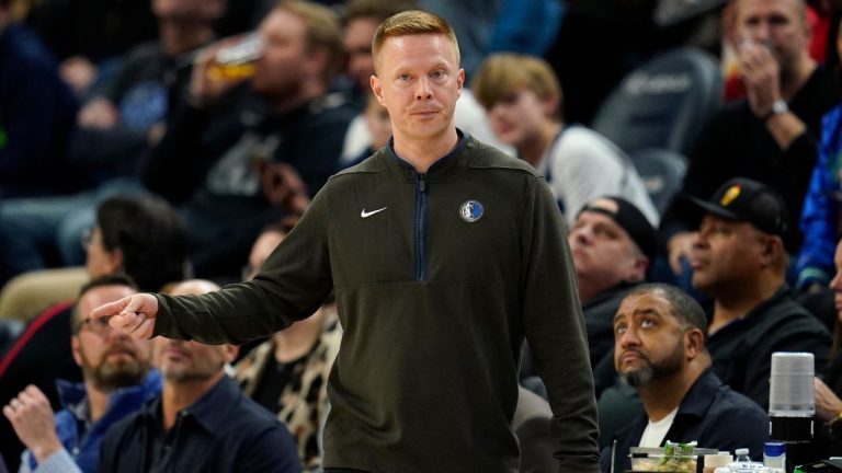 Dallas Mavericks assistant coach Sean Sweeney directs the team during the second half of an NBA game against the Minnesota Timberwolves, Dec. 19, 2022, in Minneapolis. (Abbie Parr/AP)