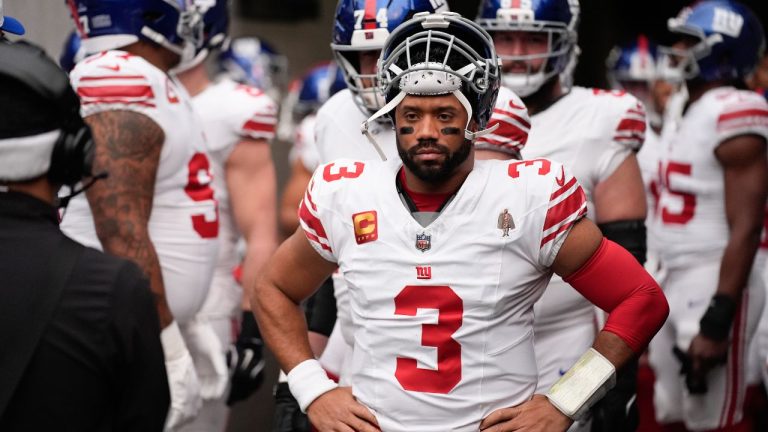 New York Giants quarterback Russell Wilson and his teammates prepare to take the field before the team's NFL football game against the Las Vegas Raiders Sunday, Dec. 28, 2025, in Las Vegas. (John Locher/AP)
