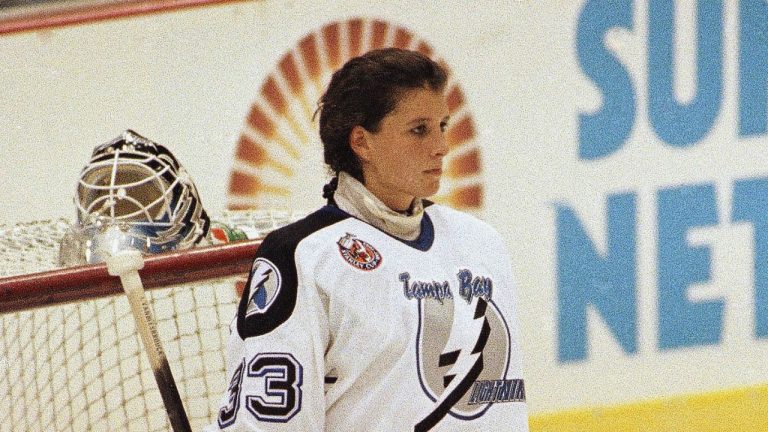 Tampa Bay Lightning goaltender Manon Rheaume listens to the national anthem prior to her professional debut against the St. Louis Blues on Sept. 23, 1992 at the Tampa Fairgrounds in Tampa, Fla. (Chris O’Meara/AP)
